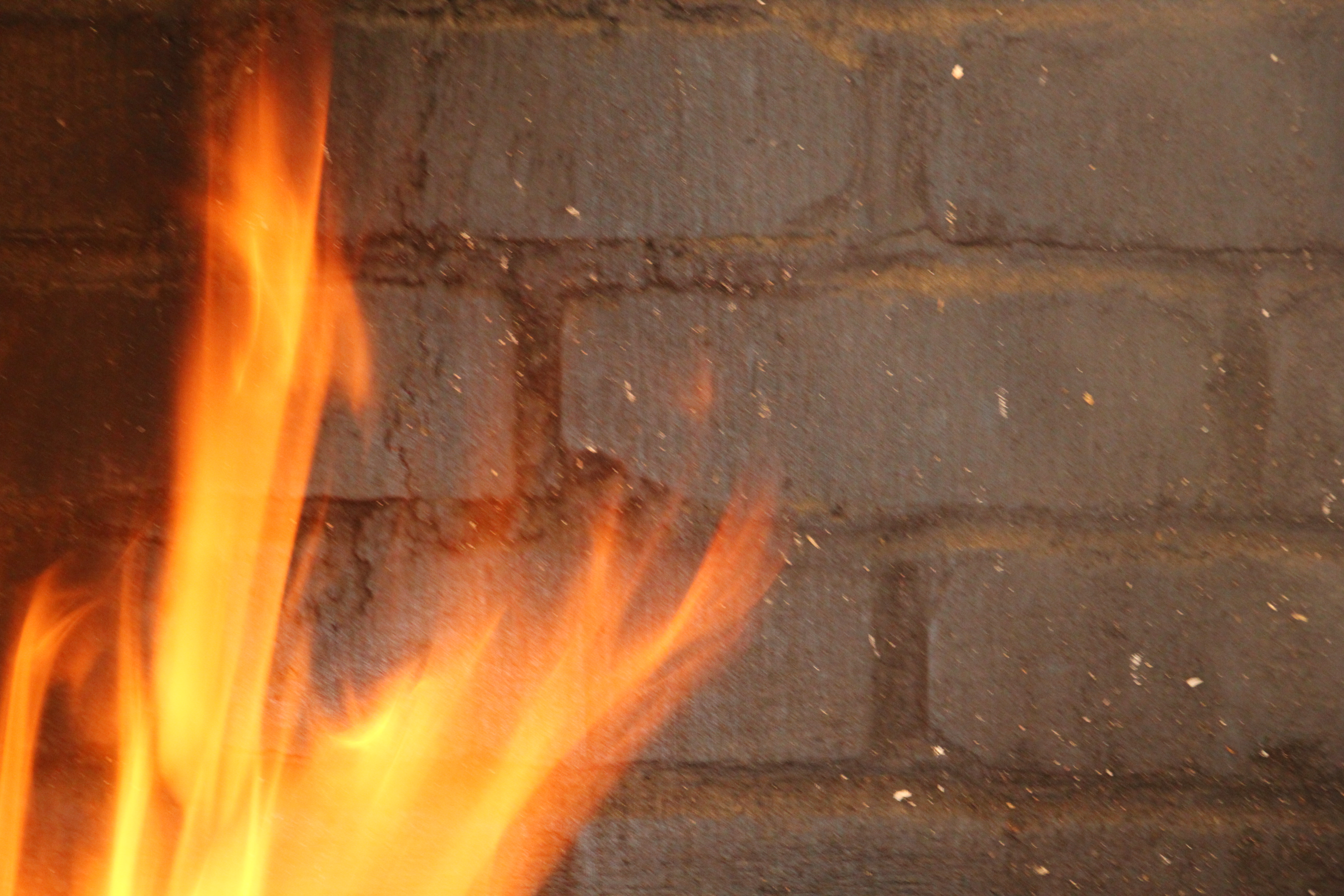 Gray Brick Wall Focus On Strong Fire