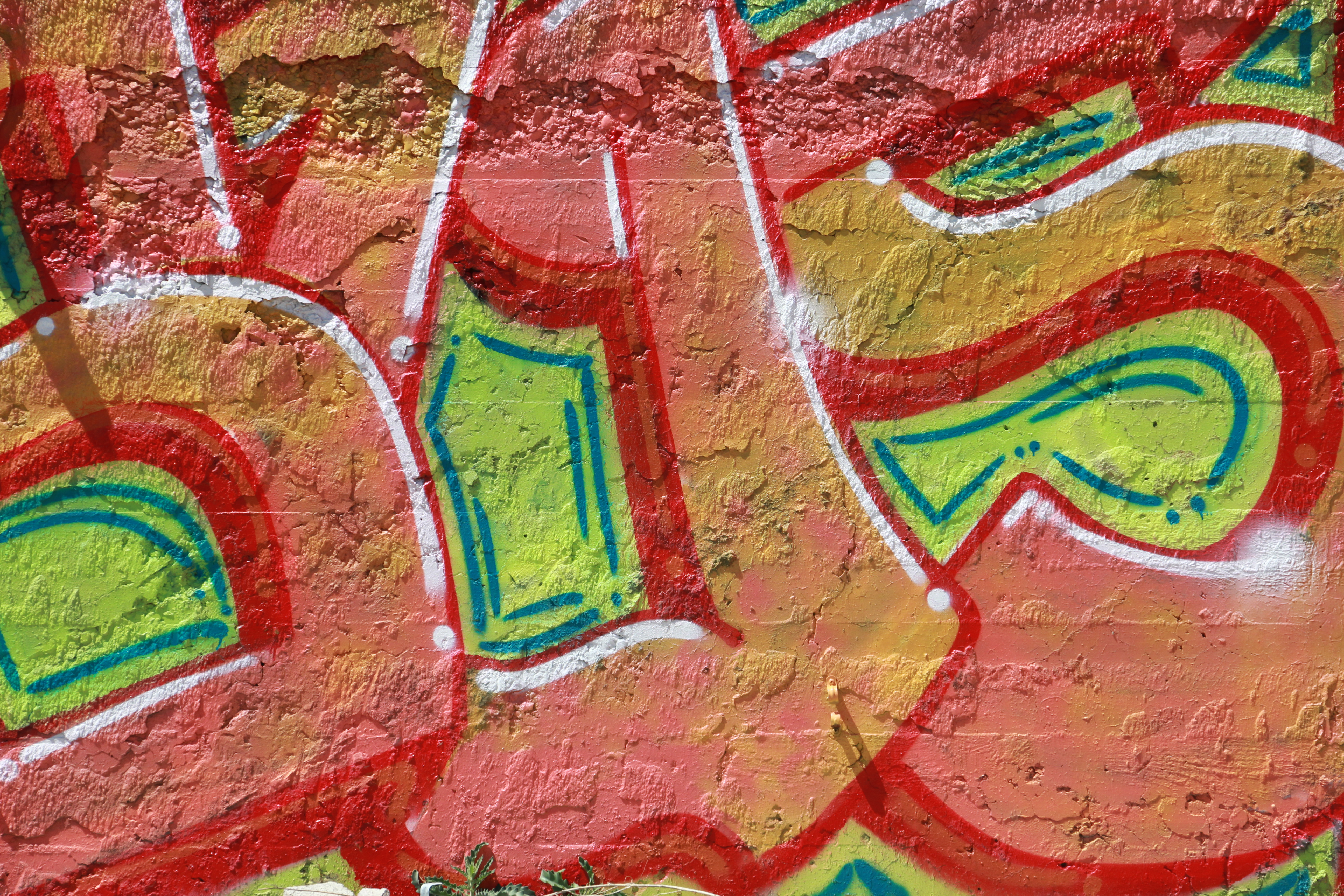 Orange Letter Spray Painted Green Graffiti